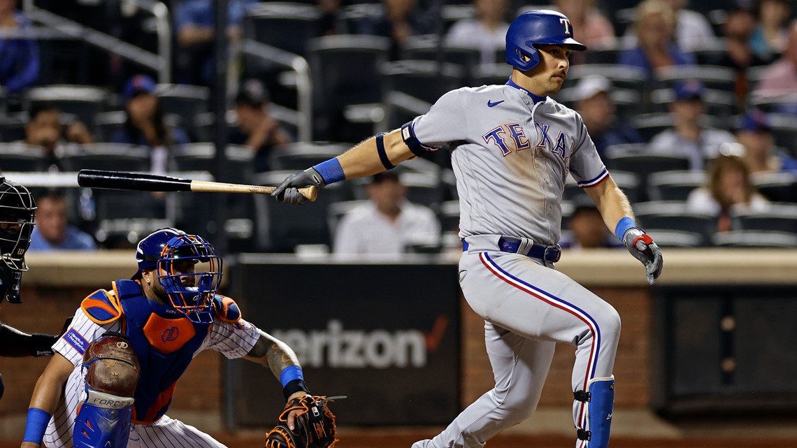 Nathaniel Lowe of the Texas Rangers celebrates a three-run home