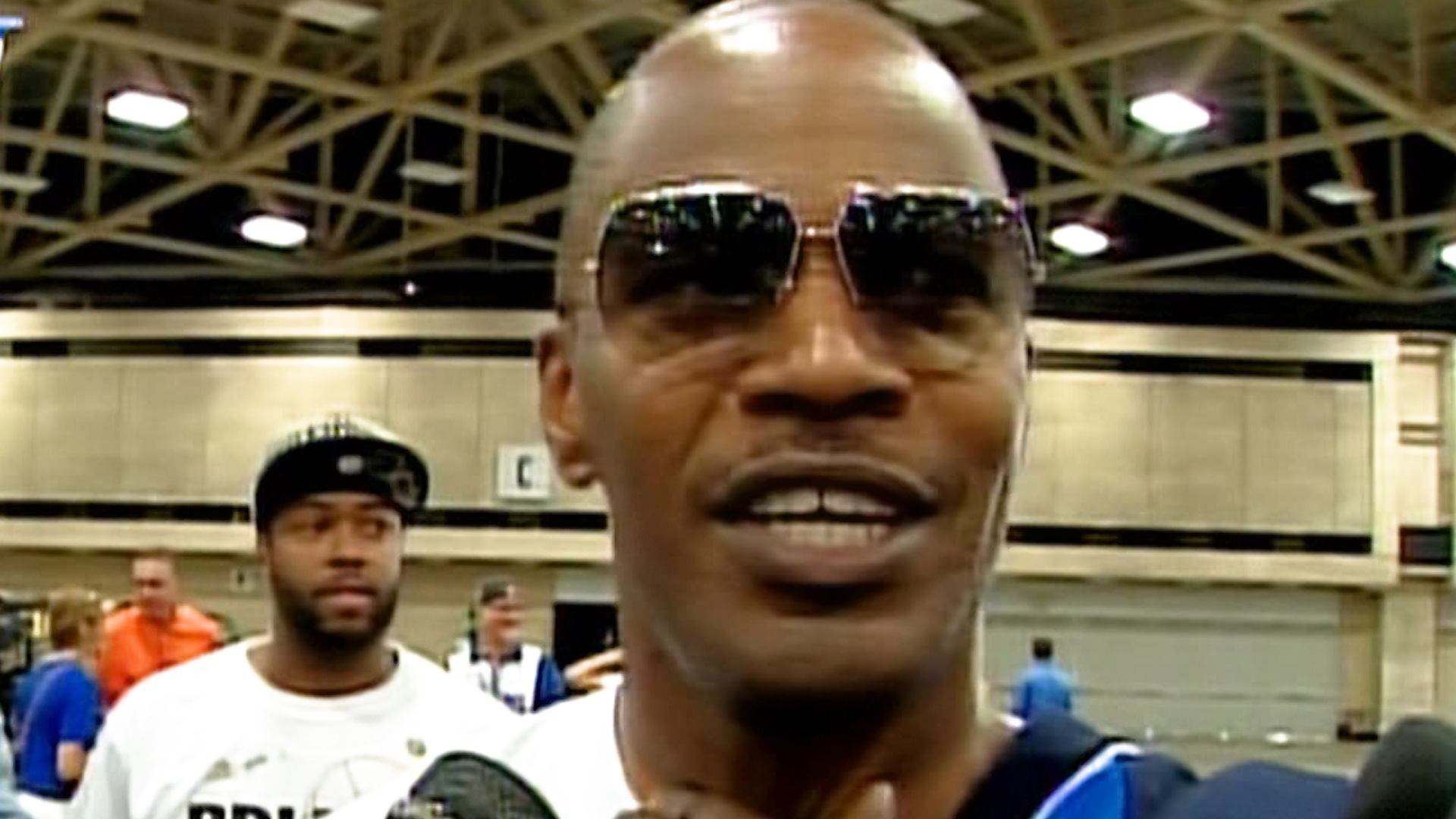 WFAA interviews actor Jamie Foxx during the Dallas Mavericks' 2011 NBA Championship Parade on June 16, 2011, in Dallas, Texas.