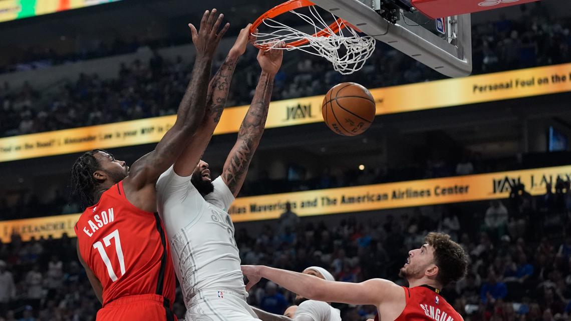 Anthony Davis dominates Rockets in Mavericks debut, but left the game with 'lower body injury'