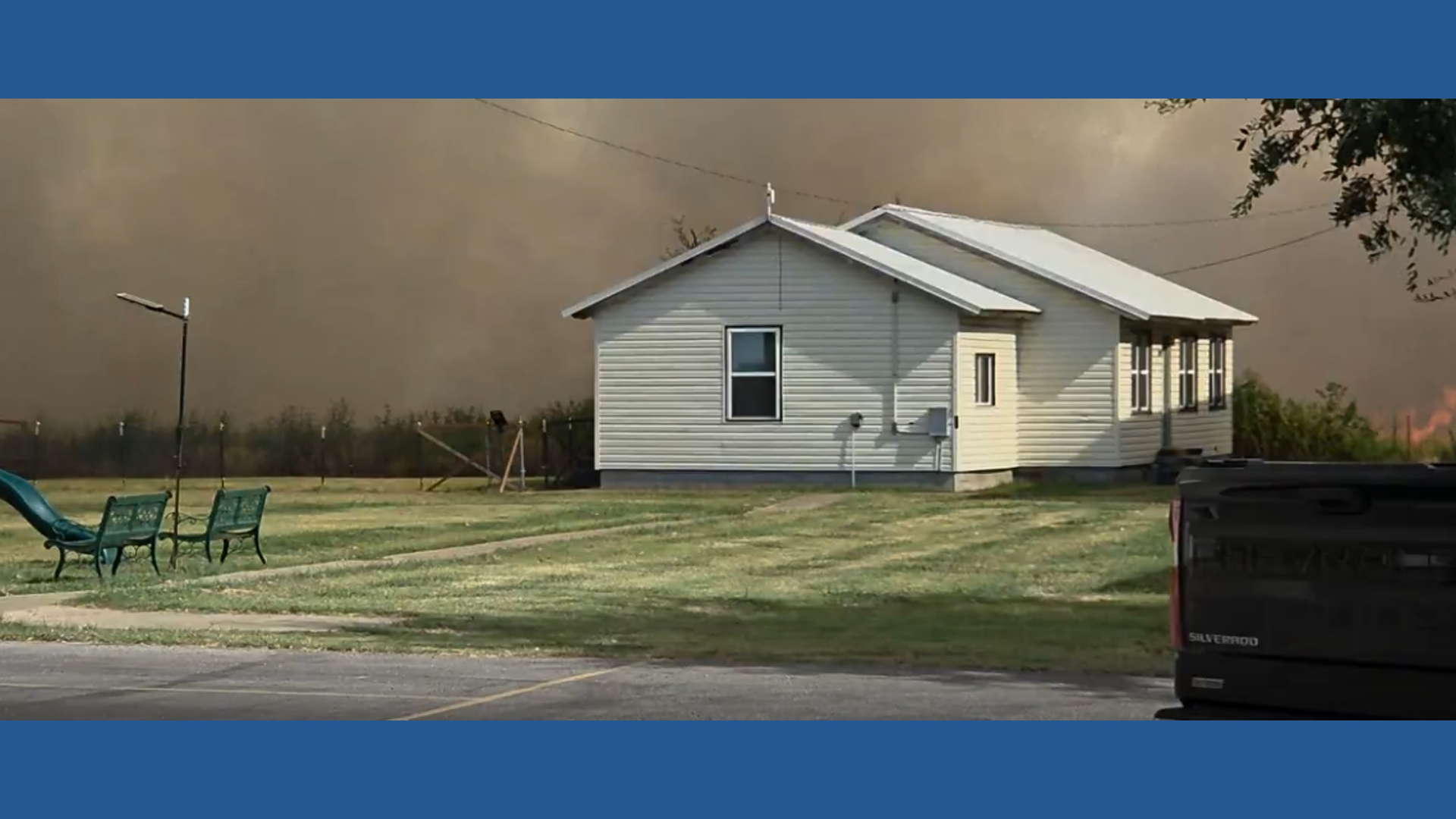 Grassfire burns around Ferris church, buildings remain untouched