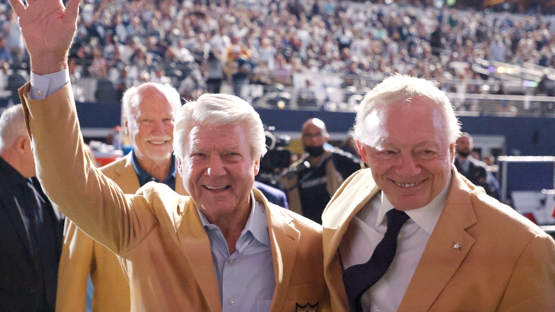 Fans in the suites cheer the unveiling of Ring of Honor honoree Tom Landry  during the halftime ceremony as the Dallas Cowboys faced the New York  Giants at Cowboys Stadium in Arlington