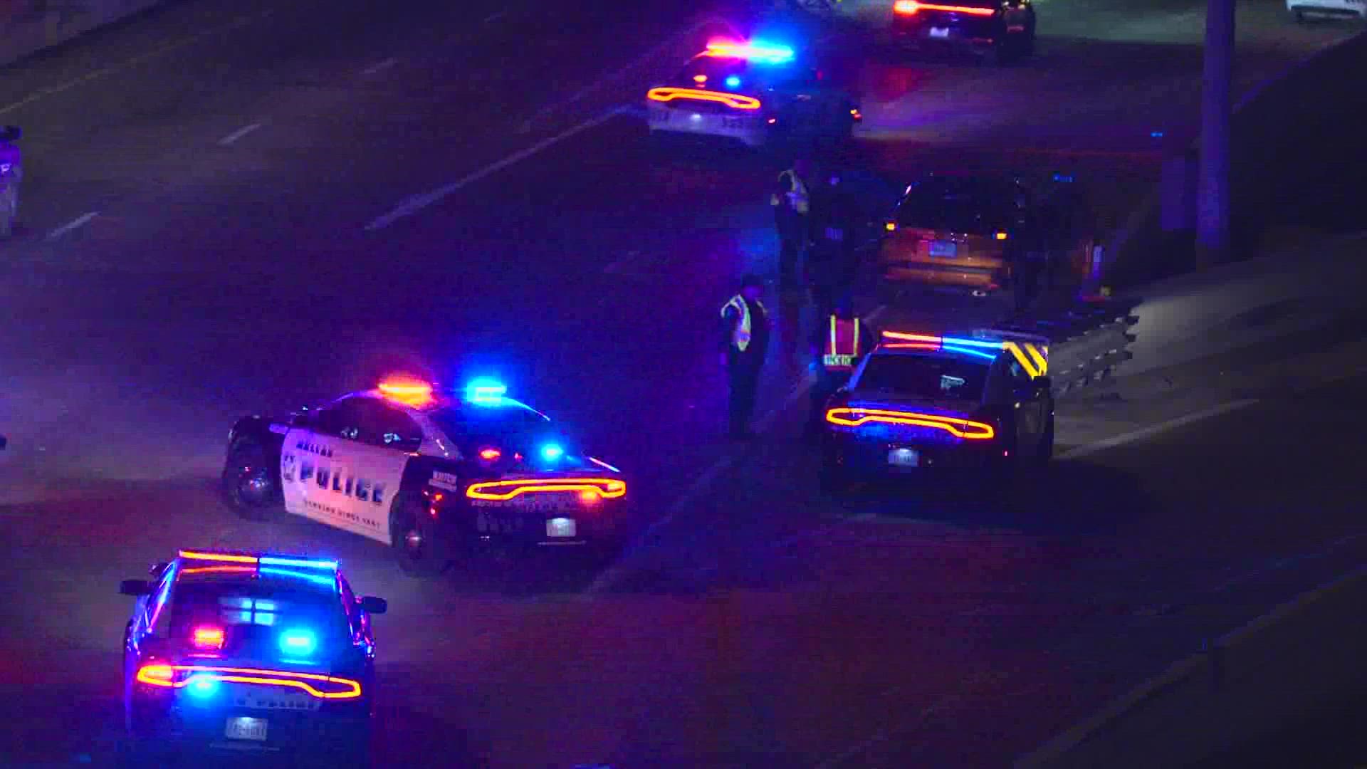Dallas police say two people in the same vehicle were hit by gunfire on the highway.