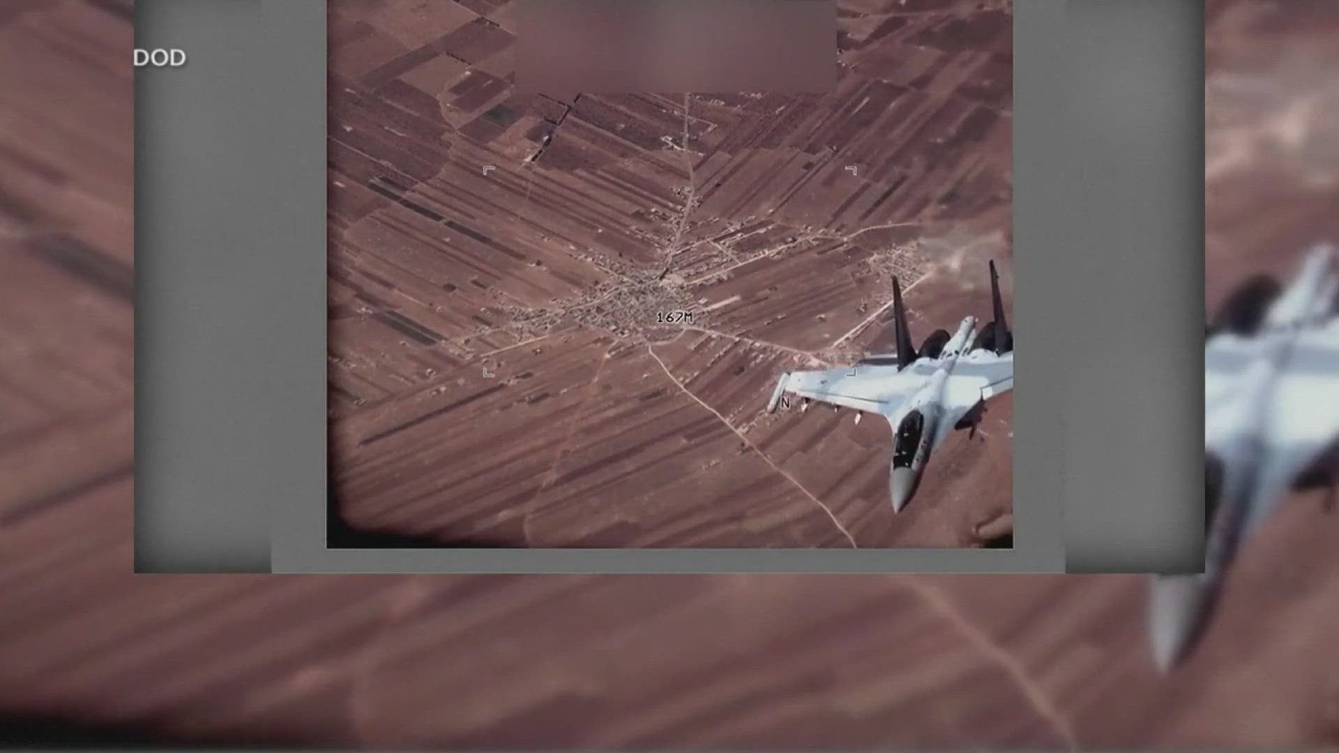 Video shows a Russian SU-35 fighter closing in on an MQ-9-Reaper, and later showed a number of the so-called parachute flares moving into the drone's flight path.