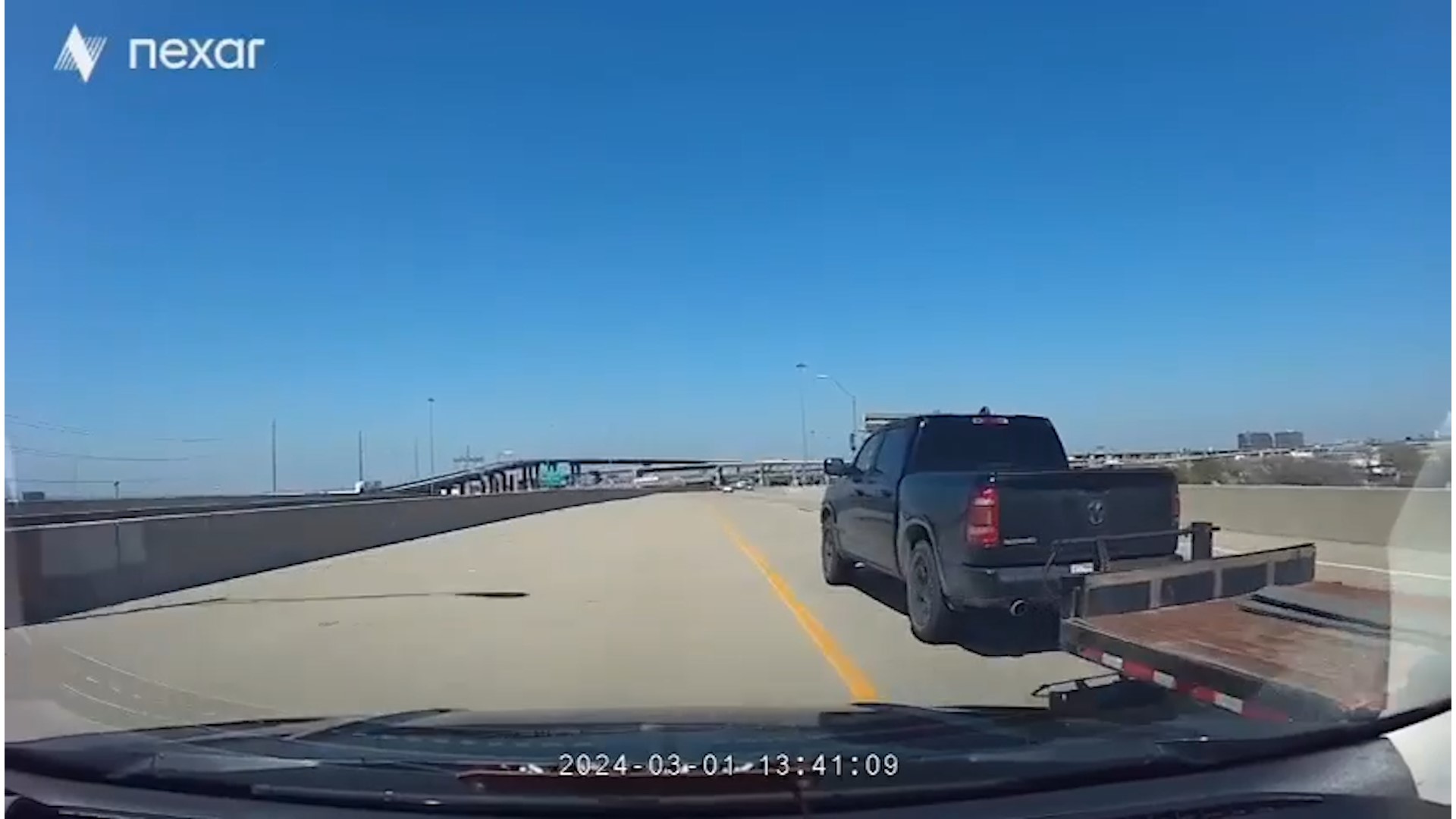 Some viral dashcam video was first posted showing a truck's flatbed trailer rip an SUV's bumper off. The SUV driver then later shared what led up to that incident.