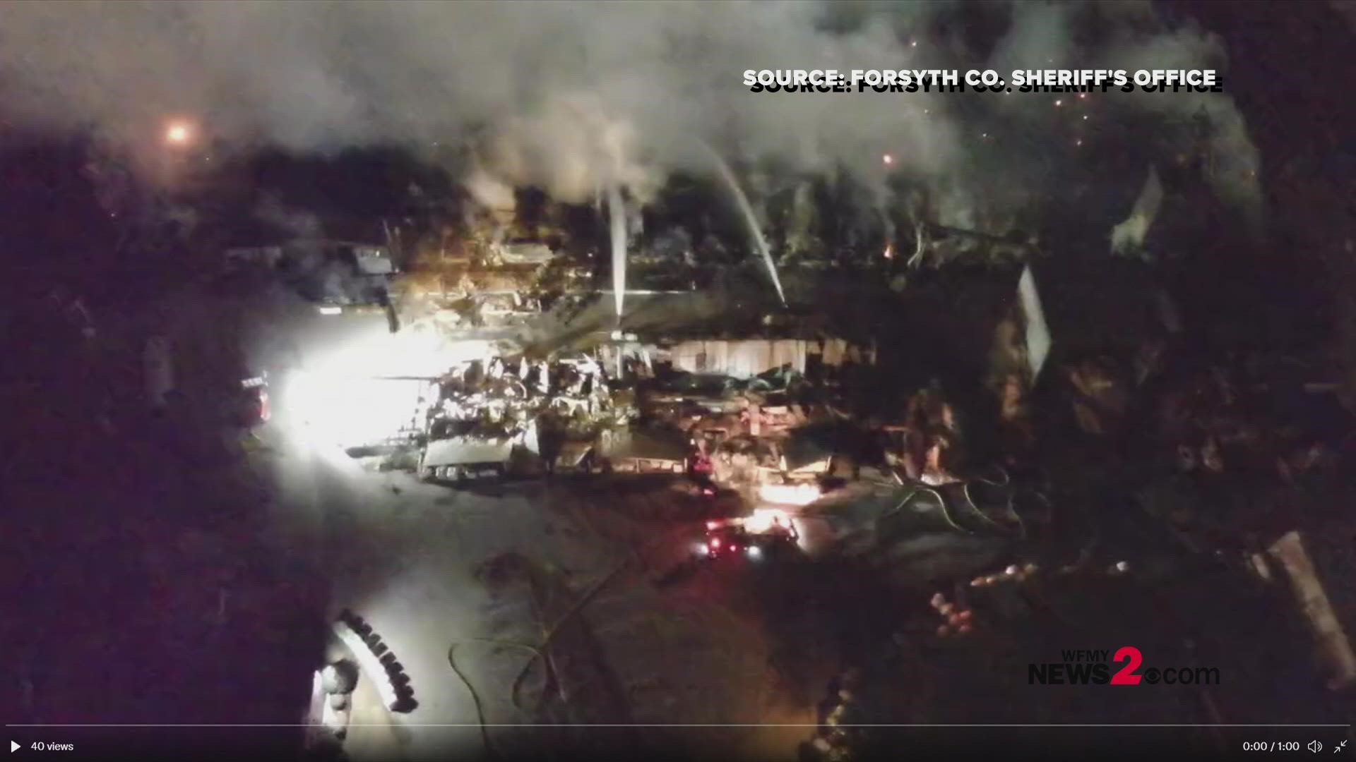Drone video from the Forsyth County Sheriff's Office shows firefighters spraying water on the Weaver plant fire in Winston-Salem Thursday night.