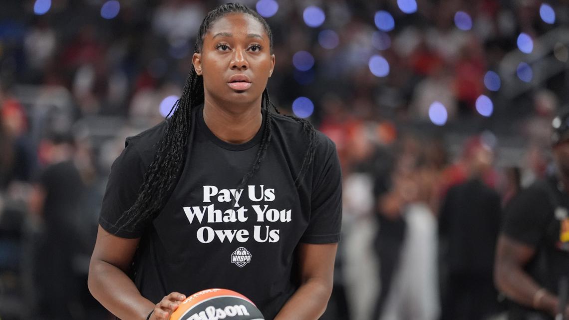 WNBA players wear ‘pay us what you owe us’ shirts before All-Star game
