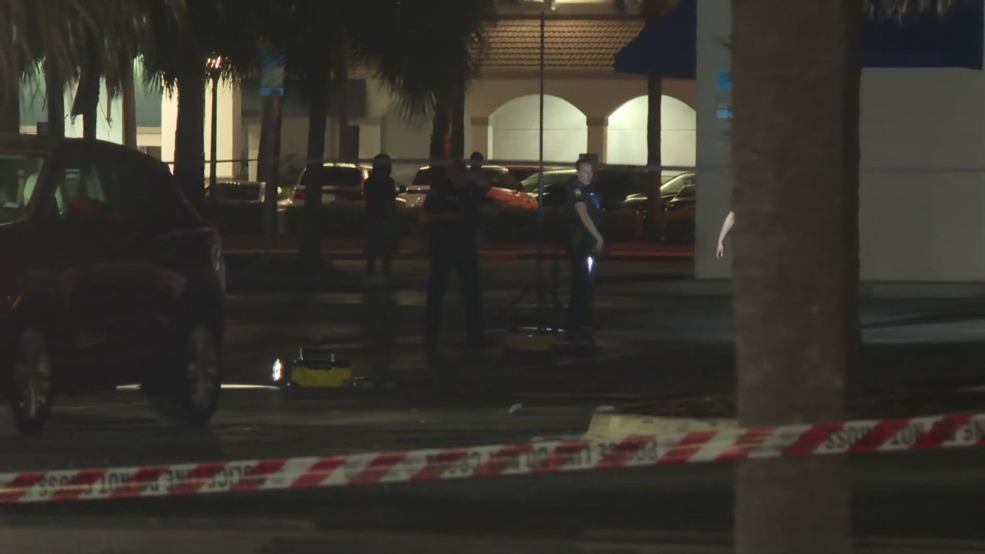 People flee a shooting in Jacksonville Beach Sunday evening.