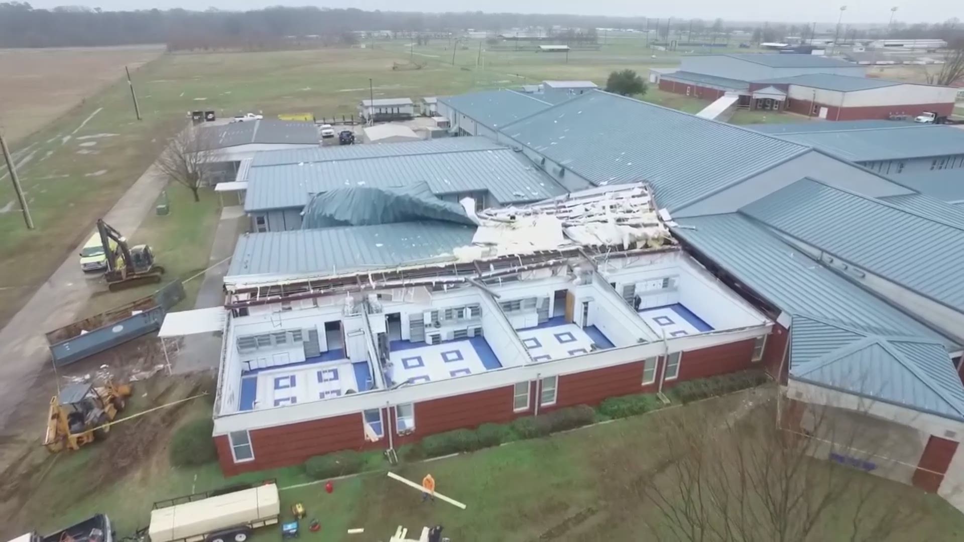Benton Middle School in Bossier Parish was damaged by the storm. Drone footage shows how its roof was peeled back by wind.